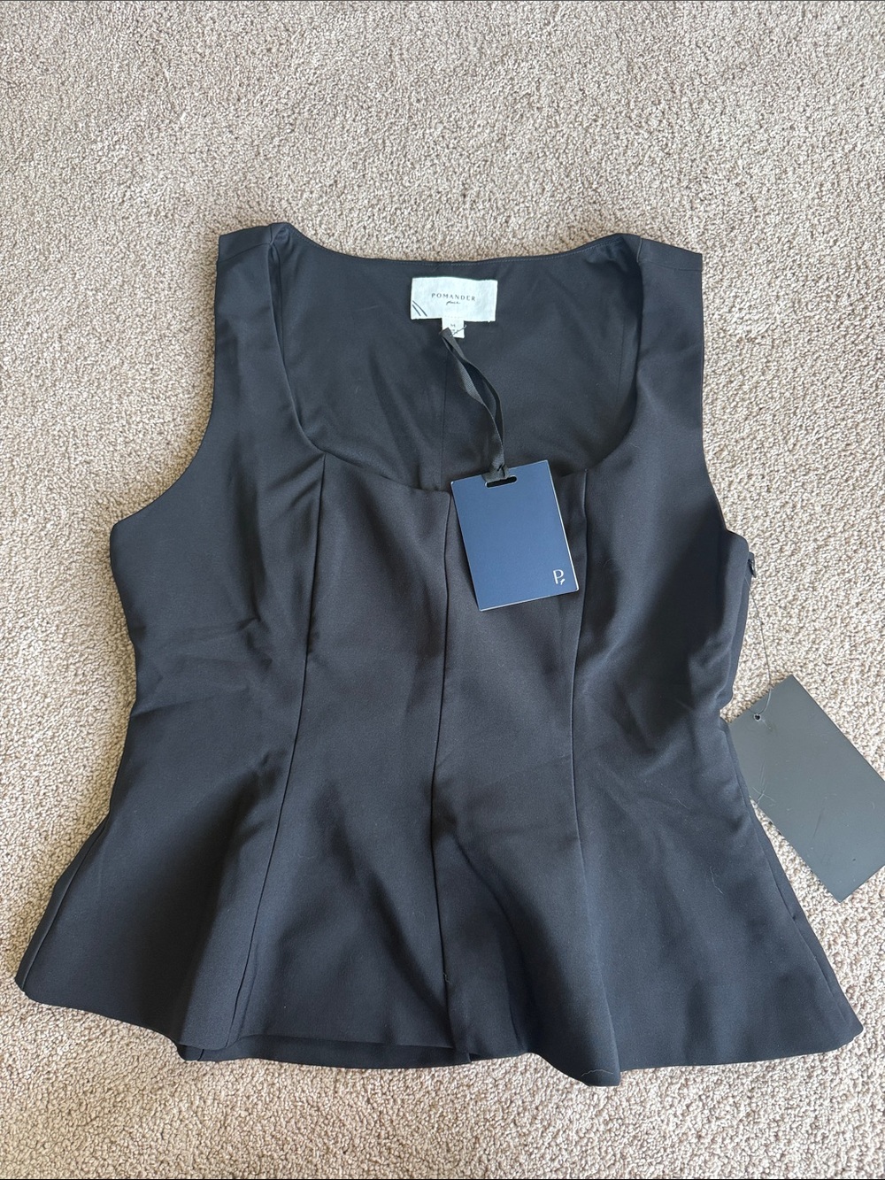 Tuckernuck black peplum top